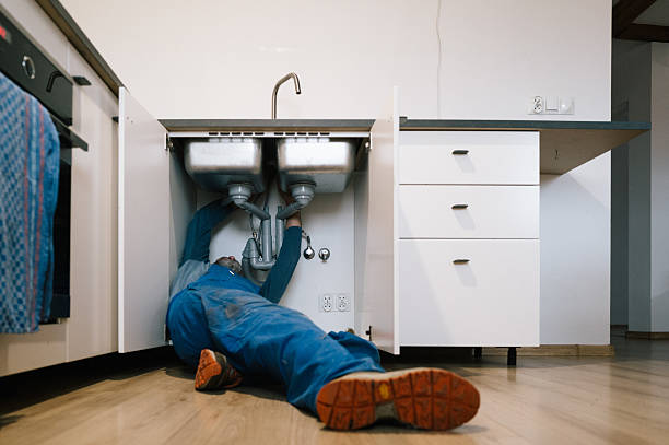 Professional Emergency Plumber technician working in Attleboro, MA